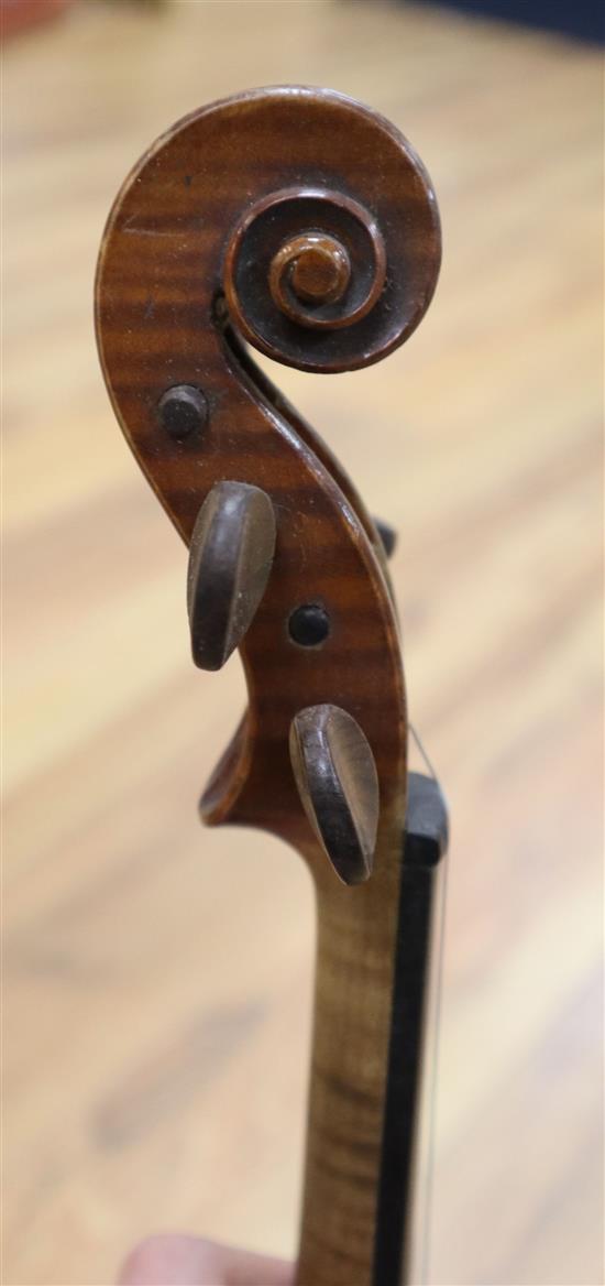 A ate 19th century German violin labelled Heinrich Schwartz Leipzig 1894 cased with a bow